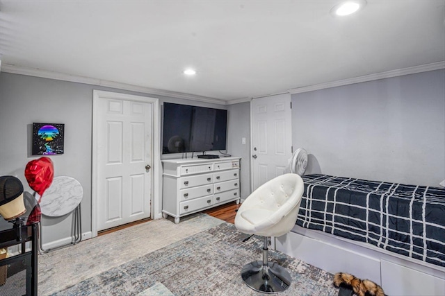 bedroom featuring ornamental molding, recessed lighting, and baseboards