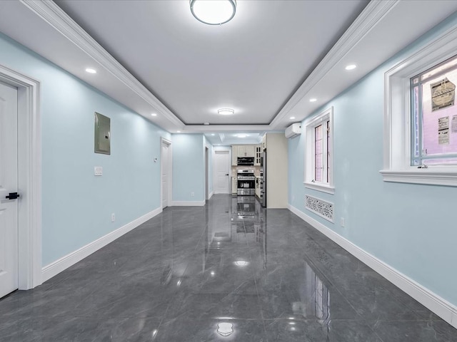 interior space featuring a wall unit AC, recessed lighting, visible vents, freestanding refrigerator, and baseboards