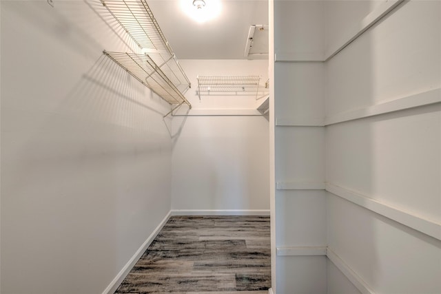 spacious closet with wood finished floors