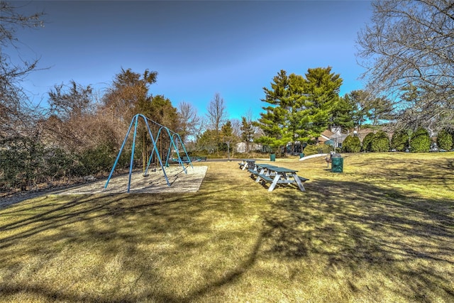 community play area with a lawn