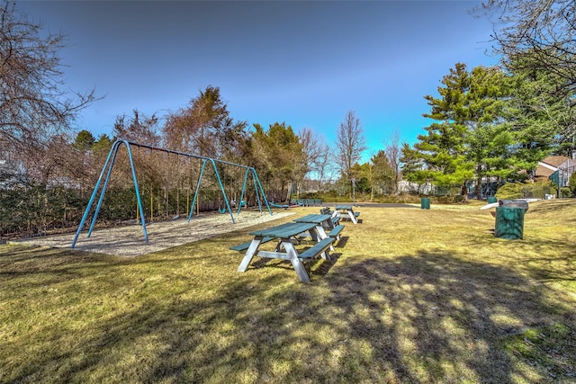 community play area with a lawn