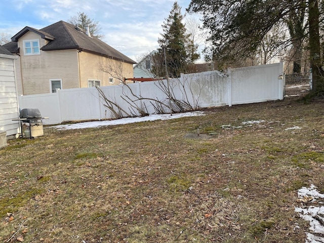 view of yard with fence