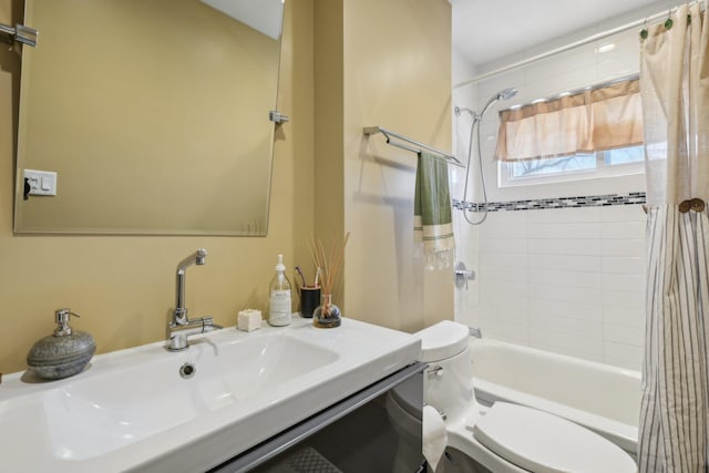 bathroom with toilet, shower / tub combo with curtain, and vanity