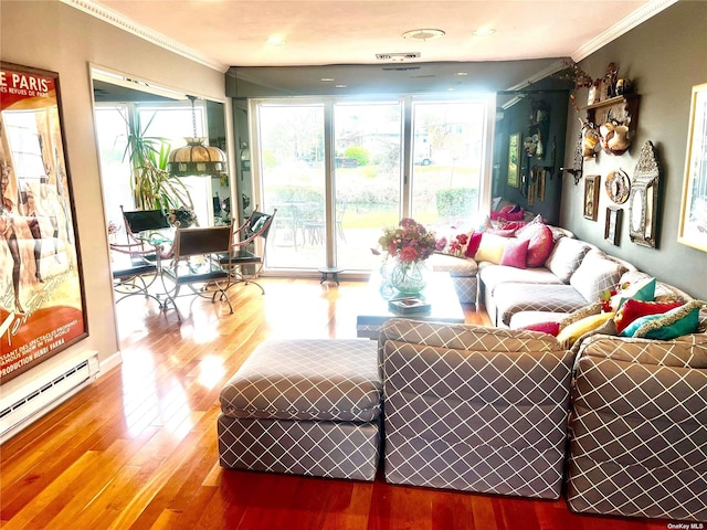 living area featuring a baseboard radiator, crown molding, and wood finished floors