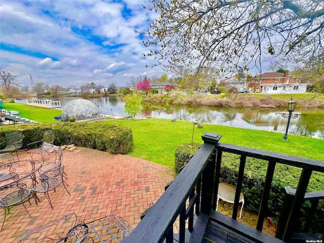 view of patio / terrace featuring a water view