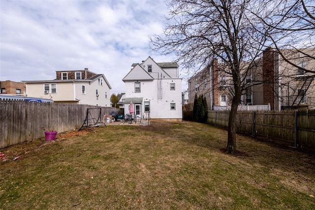 view of yard featuring a patio and a fenced backyard