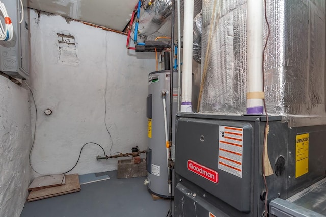 utility room featuring water heater and heating unit