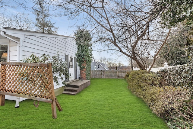 view of yard with fence