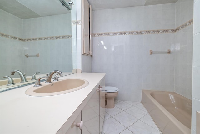 bathroom featuring toilet, tile patterned flooring, tile walls, and vanity