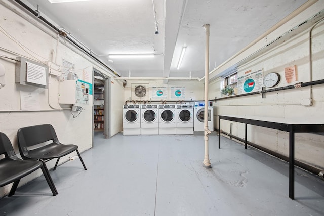 common laundry area with washing machine and clothes dryer