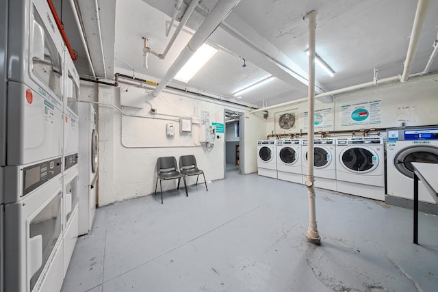 shared laundry area featuring washing machine and dryer and stacked washer and clothes dryer