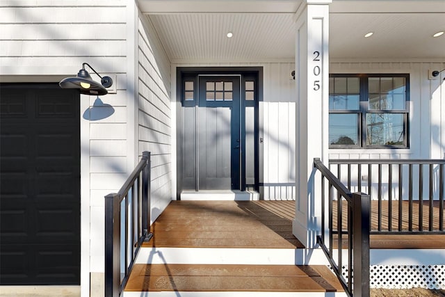 property entrance featuring a garage