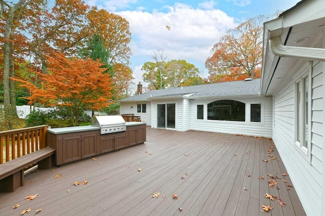 wooden deck with area for grilling