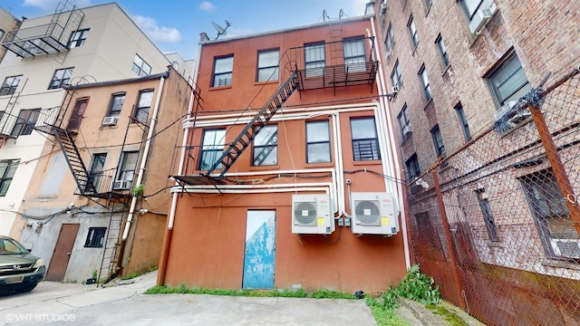 view of building exterior featuring ac unit