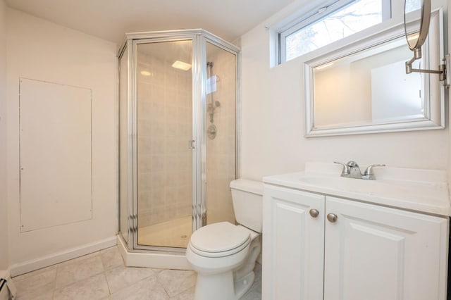 full bath featuring toilet, a stall shower, tile patterned flooring, and vanity