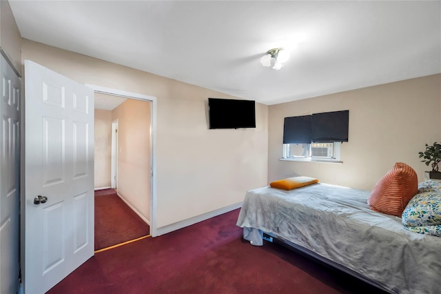 bedroom featuring carpet floors, cooling unit, and baseboards