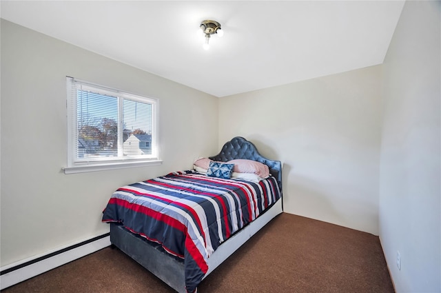 carpeted bedroom featuring a baseboard radiator