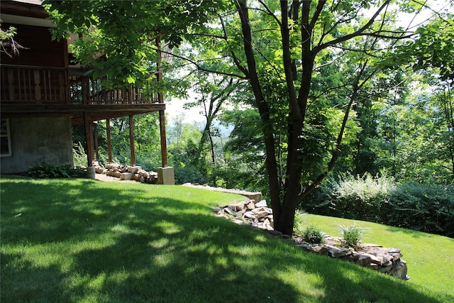 view of yard with a wooden deck