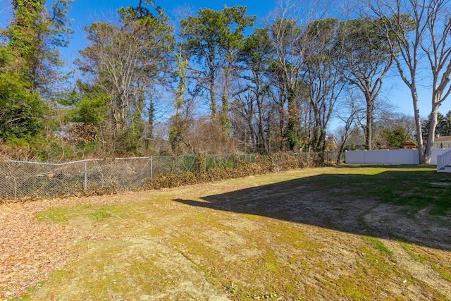 view of yard featuring fence