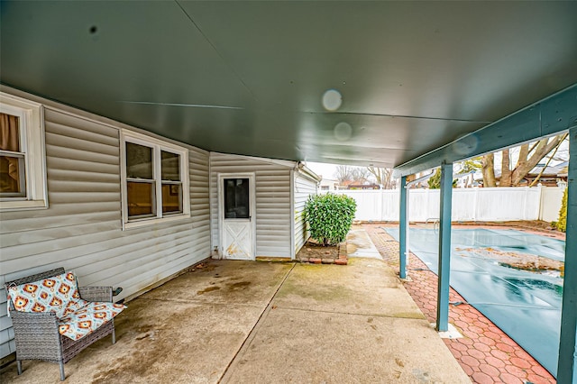 view of patio / terrace featuring a fenced in pool and a fenced backyard