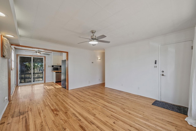 unfurnished living room featuring light wood-type flooring, ceiling fan, and crown molding