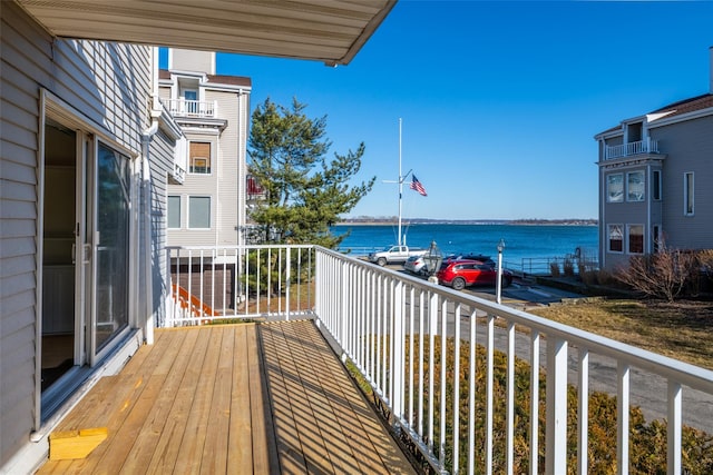 balcony featuring a water view