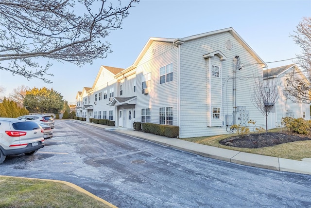 view of road featuring sidewalks and a residential view