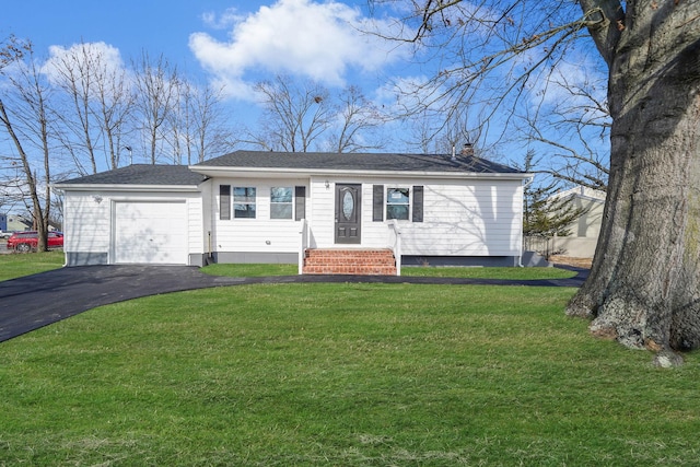 ranch-style home featuring entry steps, a chimney, aphalt driveway, an attached garage, and a front yard