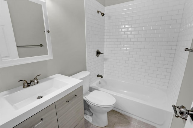 bathroom featuring tile patterned flooring, shower / bathing tub combination, vanity, and toilet