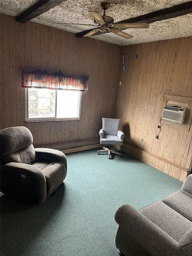 living area featuring a ceiling fan, a wall unit AC, carpet floors, wood walls, and beam ceiling