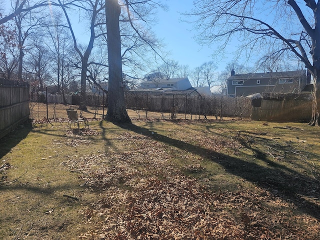 view of yard featuring fence