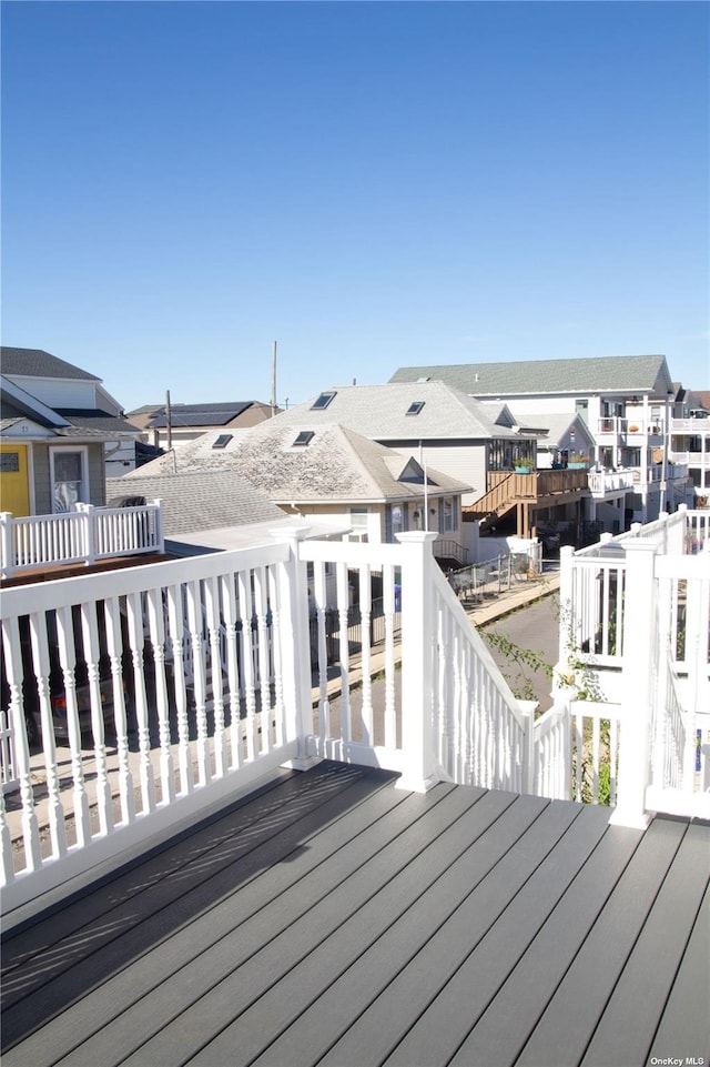 74 Wisconsin St, Long Beach, NY 11561 - wooden deck with a residential view