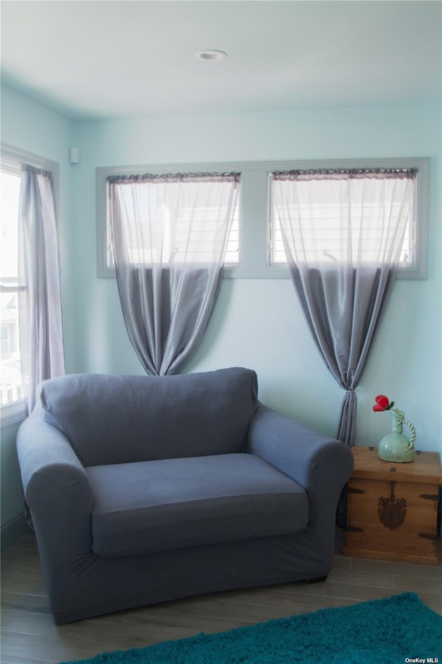 74 Wisconsin St, Long Beach, NY 11561 - living area featuring wood finished floors and a healthy amount of sunlight