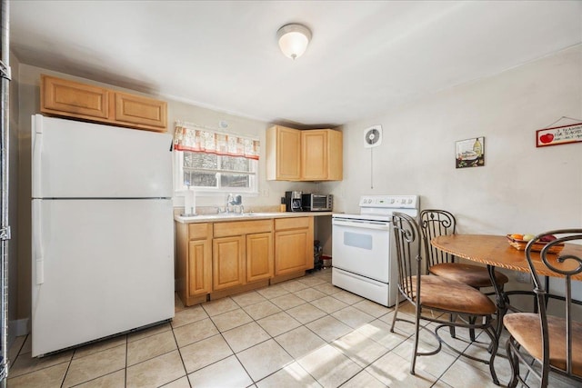 kitchen featuring light tile patterned floors, white appliances, a sink, visible vents, and light countertops