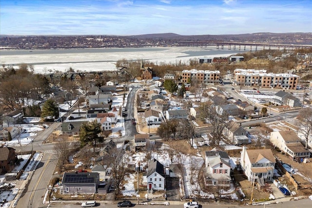 birds eye view of property with a residential view