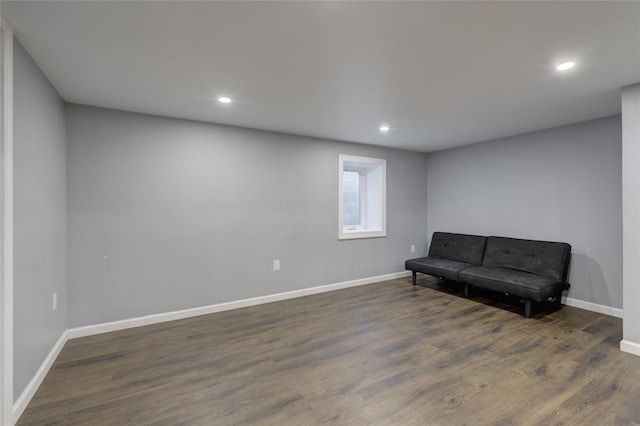 sitting room with recessed lighting, dark wood-style flooring, and baseboards