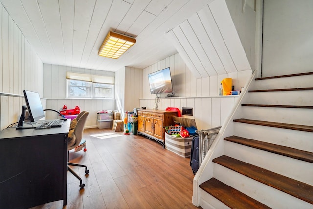 home office with wood finished floors and wood ceiling