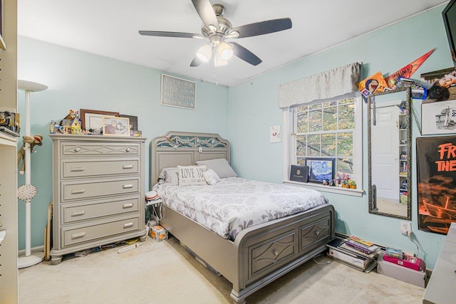 bedroom featuring ceiling fan and light colored carpet