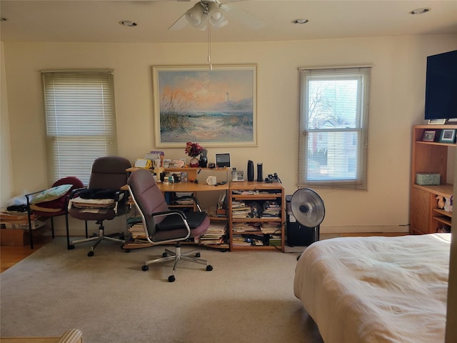 bedroom with carpet floors and recessed lighting