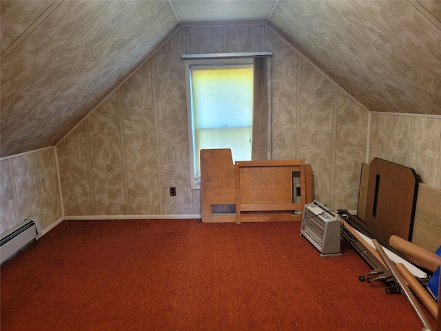 bonus room featuring carpet, a baseboard heating unit, vaulted ceiling, and baseboards