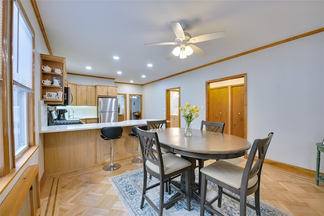 dining area with baseboards, crown molding, a ceiling fan, and recessed lighting