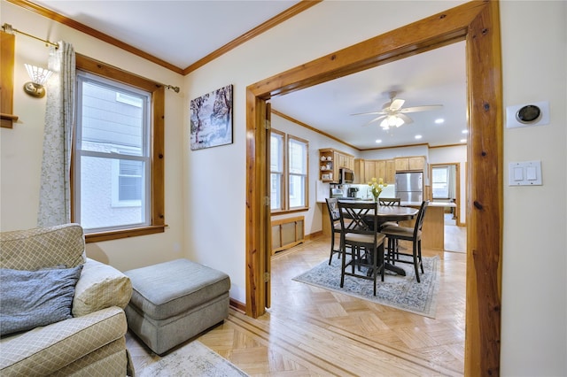 dining space with ornamental molding, recessed lighting, ceiling fan, and baseboards