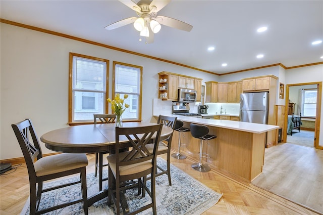 kitchen featuring a peninsula, light countertops, appliances with stainless steel finishes, light brown cabinetry, and open shelves