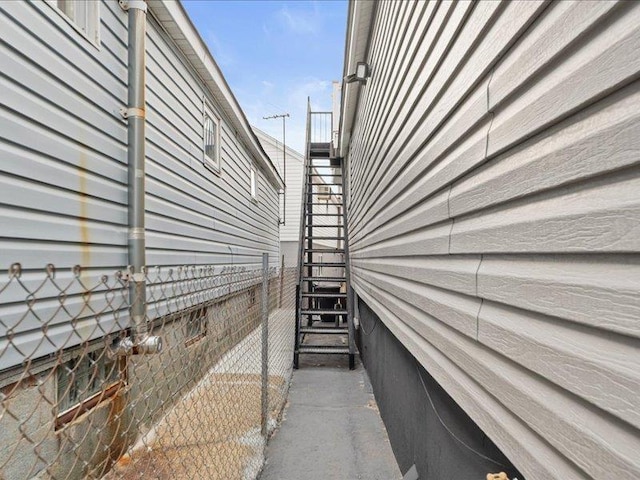 view of property exterior featuring stairs