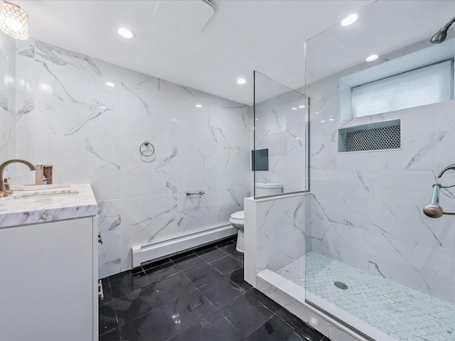 bathroom featuring toilet, a marble finish shower, a baseboard heating unit, and tile walls