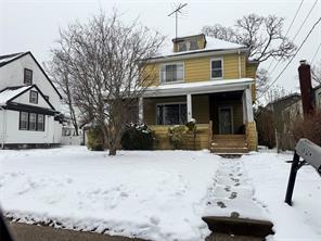 traditional style home with a porch