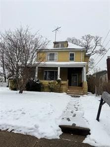 traditional style home with covered porch