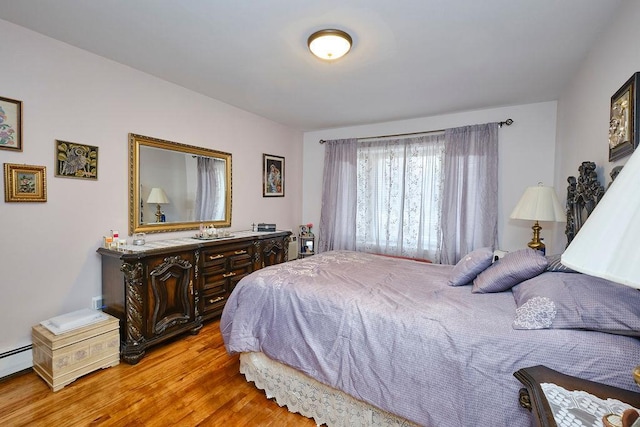 bedroom with light wood-style floors