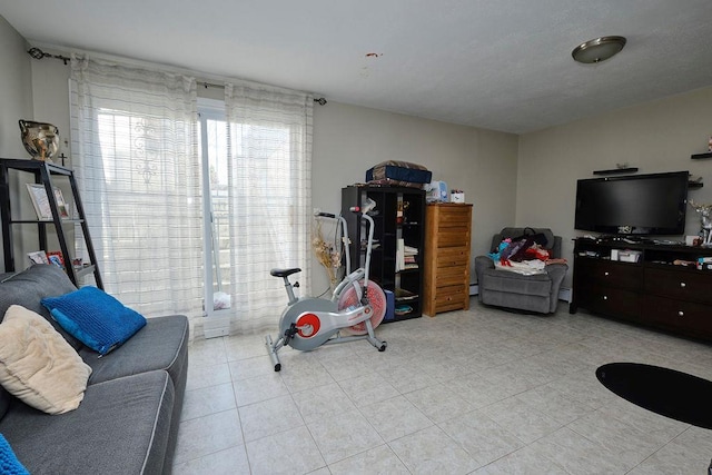 recreation room with light tile patterned floors