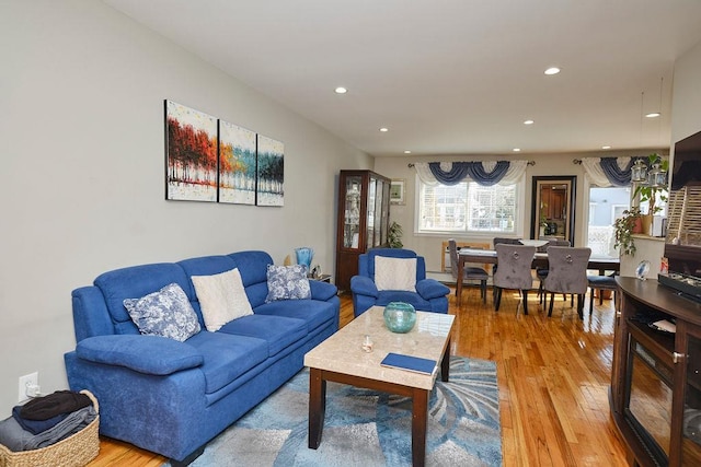 living room featuring light wood-style floors and recessed lighting